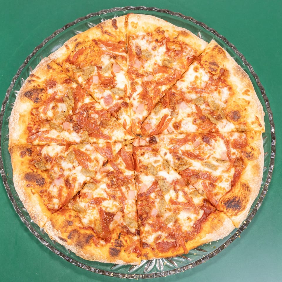 Indulge in Our Meat Lovers Pizza
